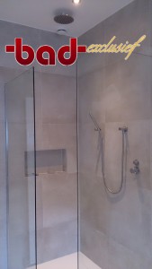 badexclusief ontwerp en realisatie van een droom-badkamer met walk-in-shower te assen. solid surface, rvs-kranen, nano-tech-glas en concrete tegelwerk. top kwaliteit in een schitterend design.